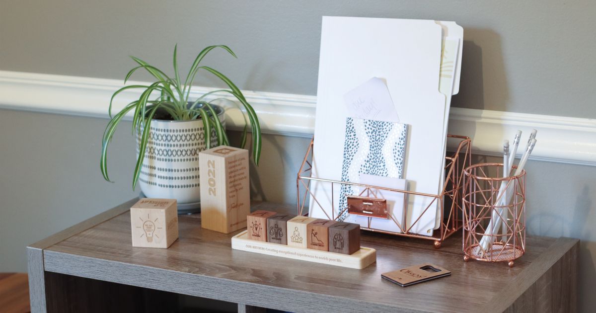 Selection of Smiling Tree Gifts' wooden employee appreciation gifts, tailored for different roles and sustainably made for values-based corporate gifting.