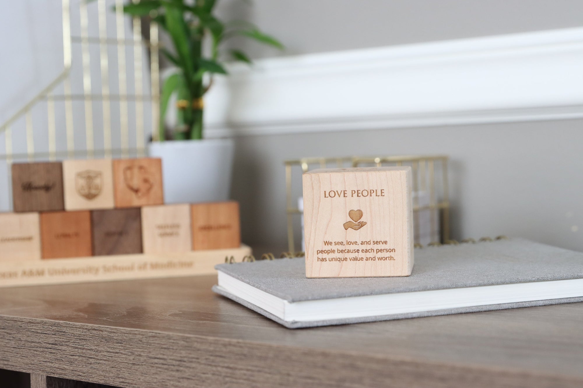 Use Smiling Tree Gifts Core Values Statement Display Blocks and Core Values Block and Tray Sets to encourage actionable Core Values within the workplace